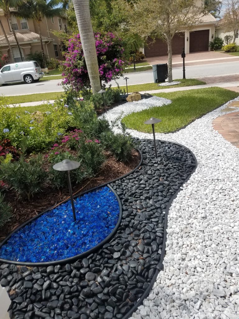 front yard landscape stone work - Universal Landscape, Inc.